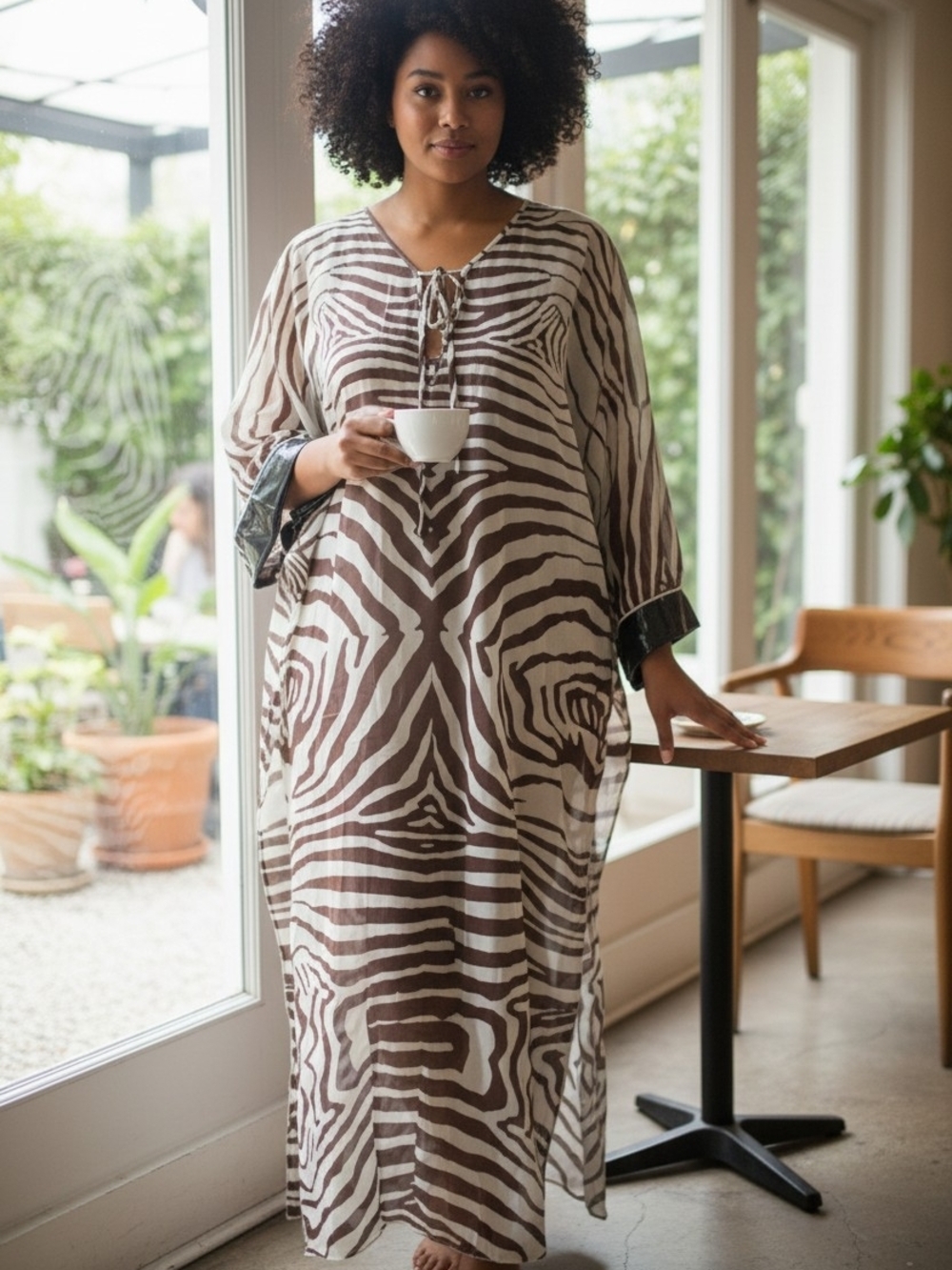 Elegant Zebra-Print Maxi Dress in Brown and Cream